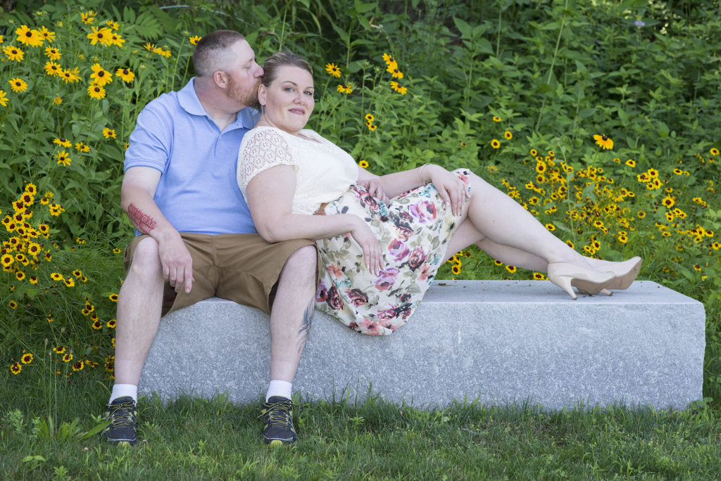 couple next to daisys