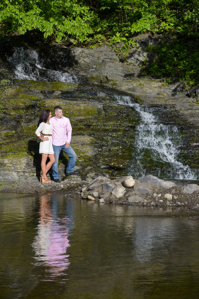 Couple by a waterfall